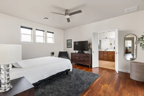 a bedroom with a bed and furniture