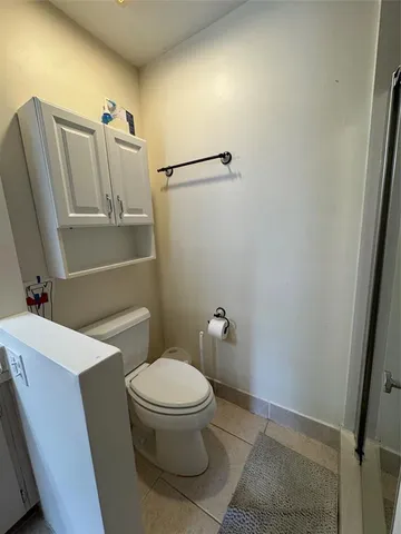 a bathroom with a sink and shower