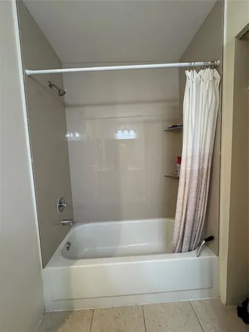 a view of a door and a window