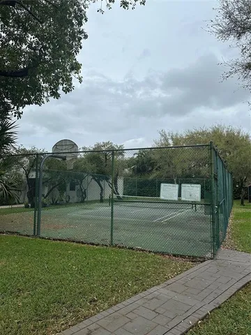 a view of swimming pool with outdoor seating