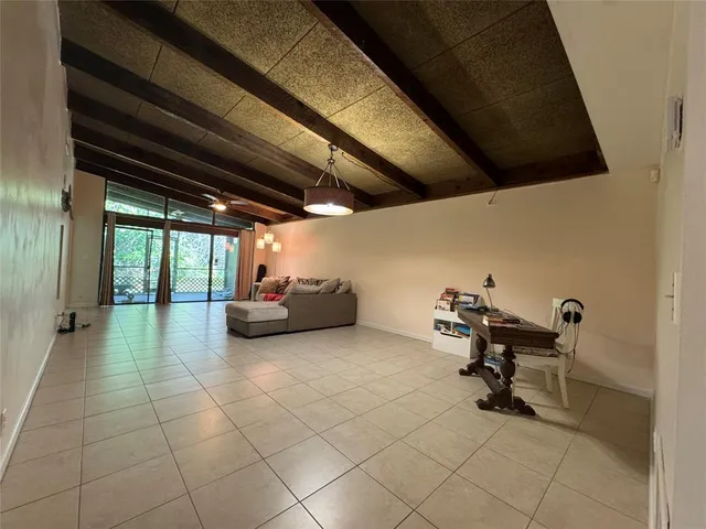 a view of a chairs and table in a room