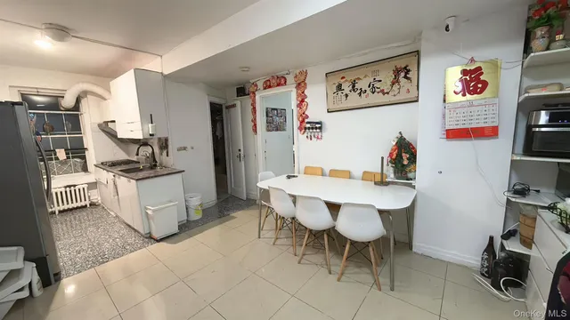 a view of a room with workspace and toys