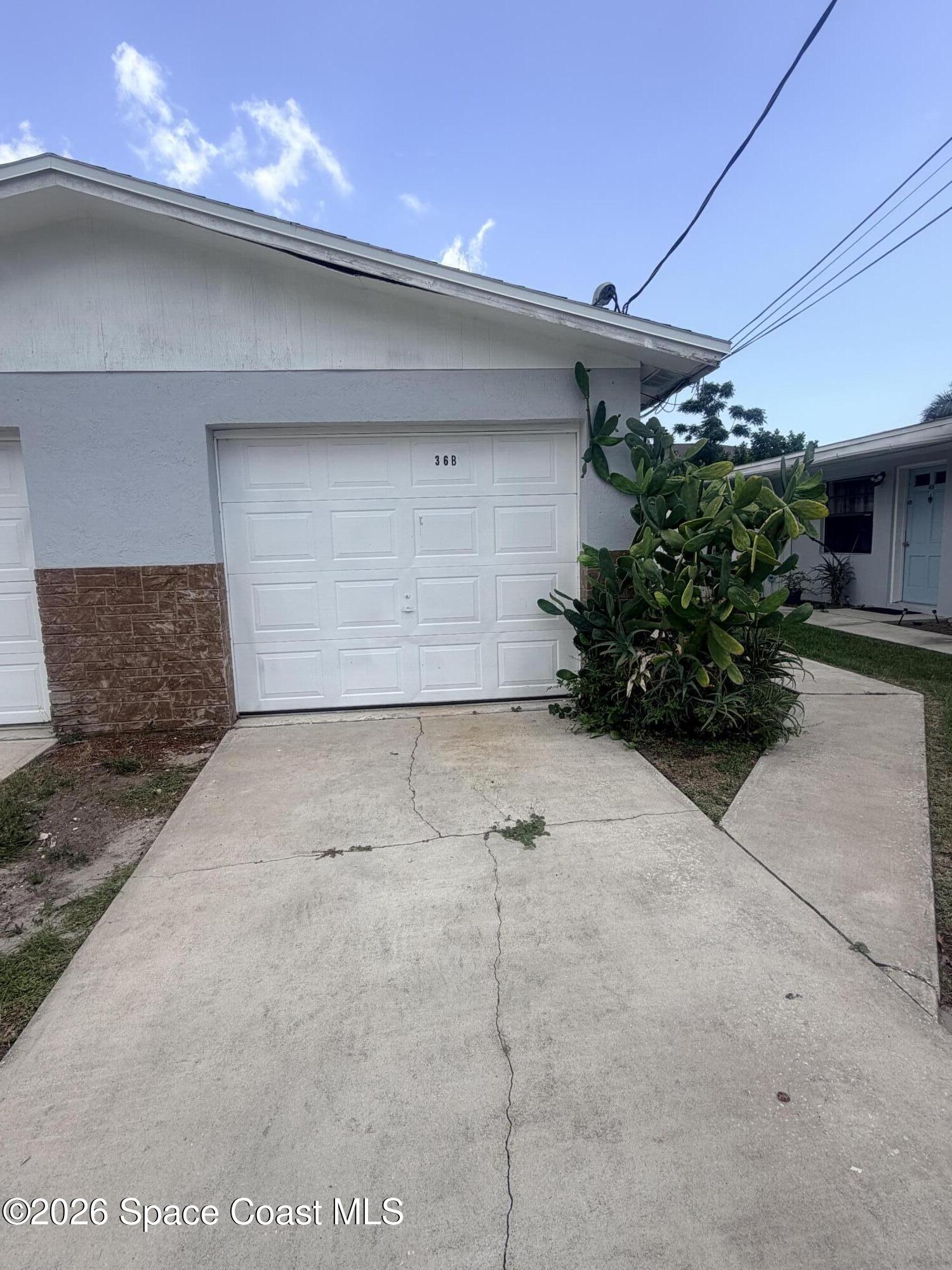 36 Elton Street, Unit B Melbourne, FL 32935 - Photo 1 of 13 Garage