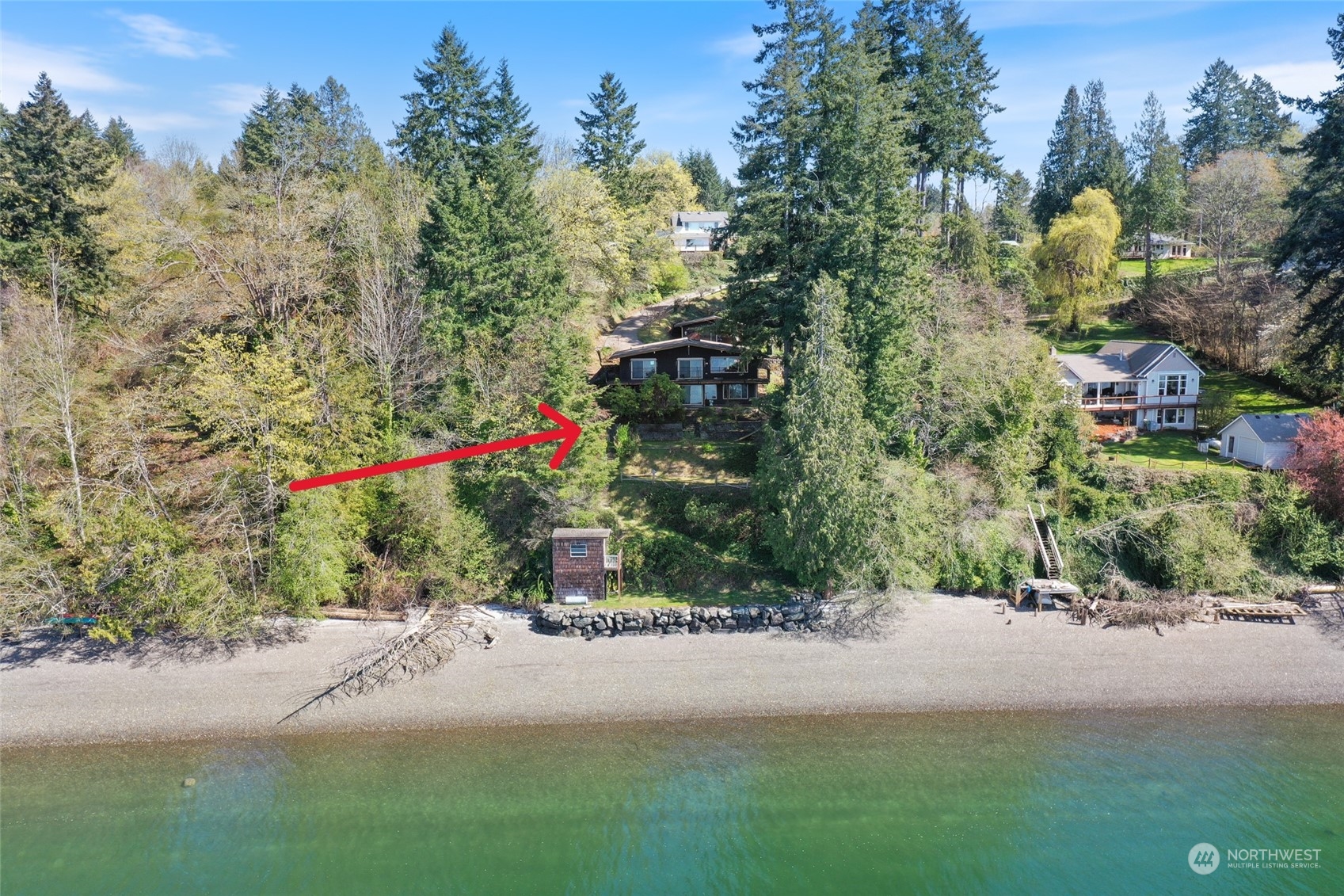 3545 Boston Harbor Road Northeast Olympia, WA 98506 - Photo 1 of 36 a picture of a road with a building in the background