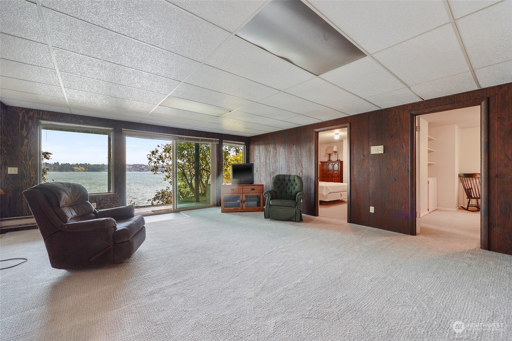 3545 Boston Harbor Road Northeast Olympia, WA 98506 - Photo 21 of 36 a large room with furniture and large windows