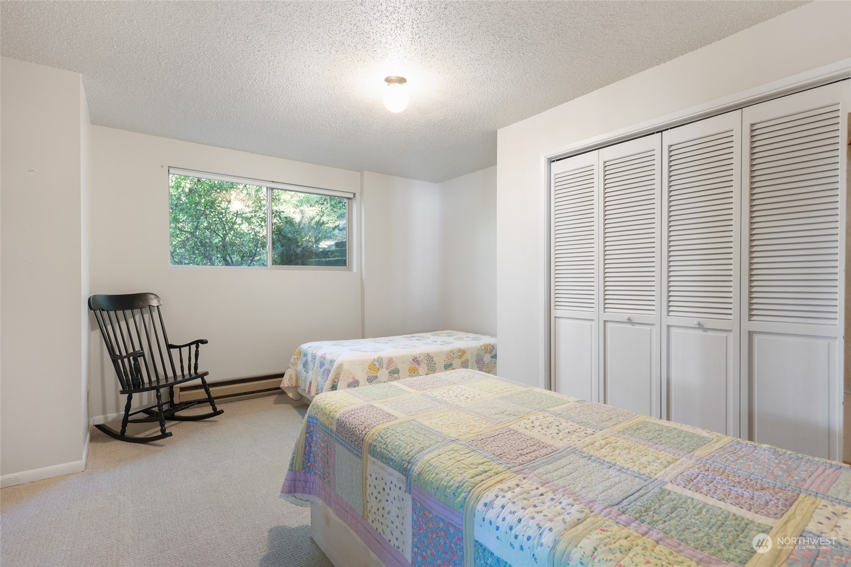 3545 Boston Harbor Road Northeast Olympia, WA 98506 - Photo 24 of 36 a bedroom with a bed and a window