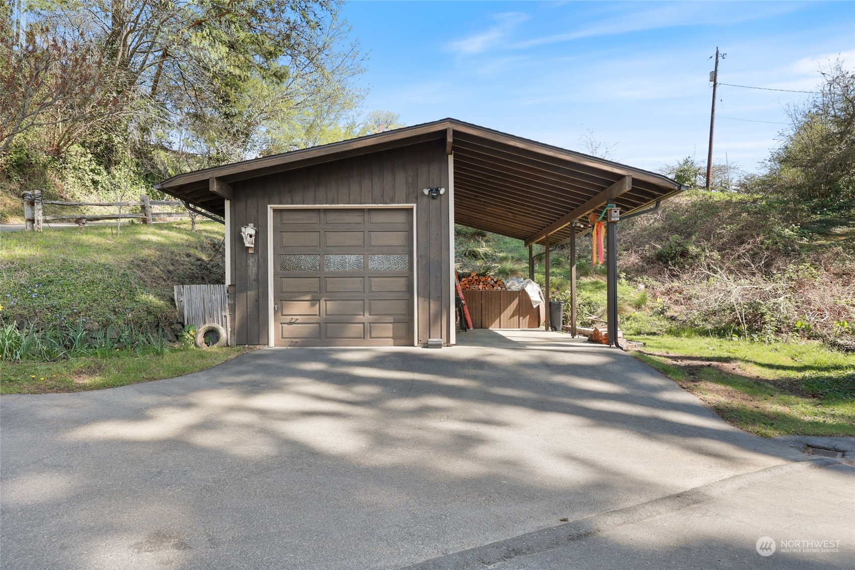 3545 Boston Harbor Road Northeast Olympia, WA 98506 - Photo 29 of 36 a front view of a house with a yard