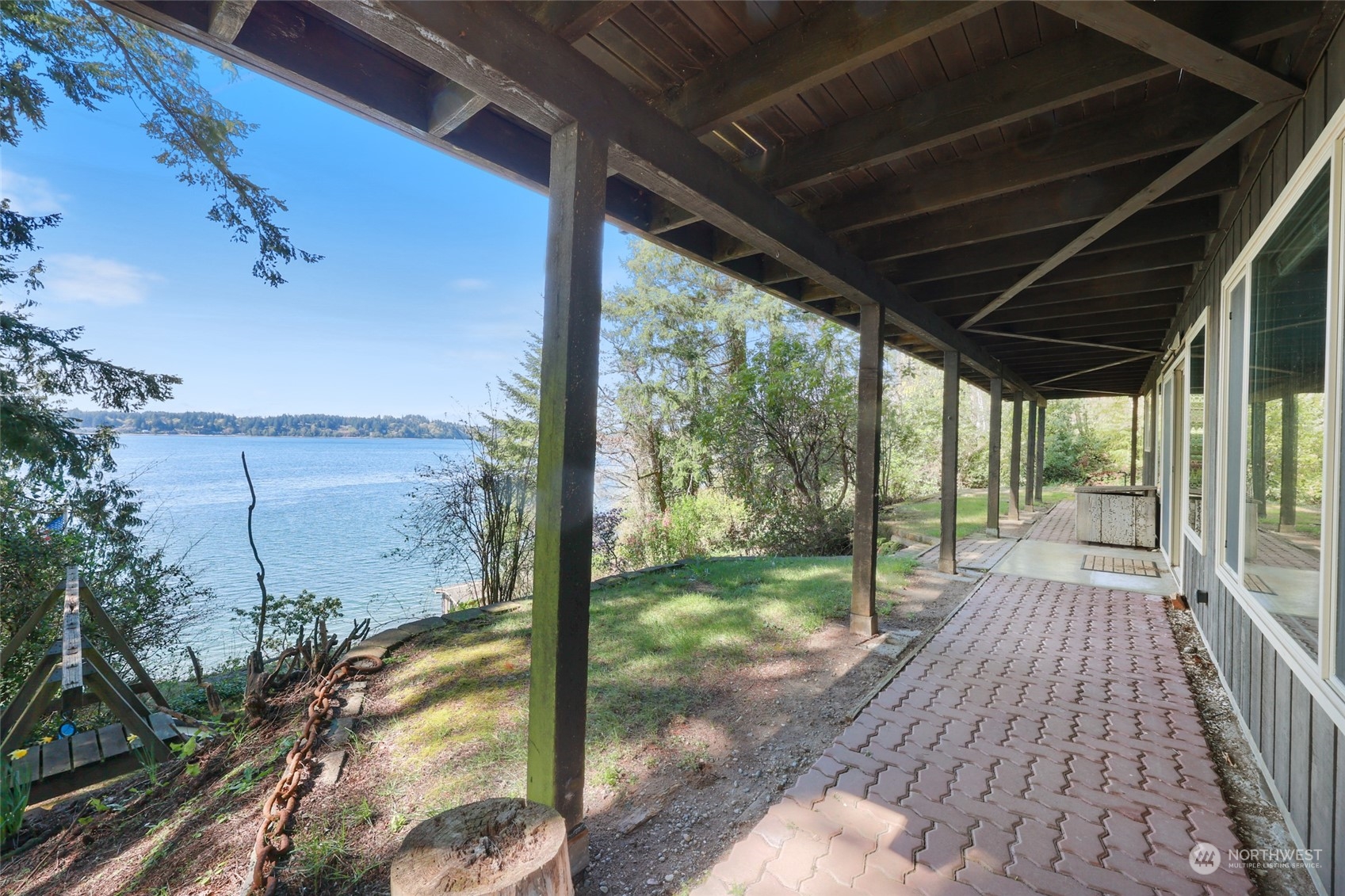 3545 Boston Harbor Road Northeast Olympia, WA 98506 - Photo 32 of 36 a view of backyard with mountain view and wooden floor