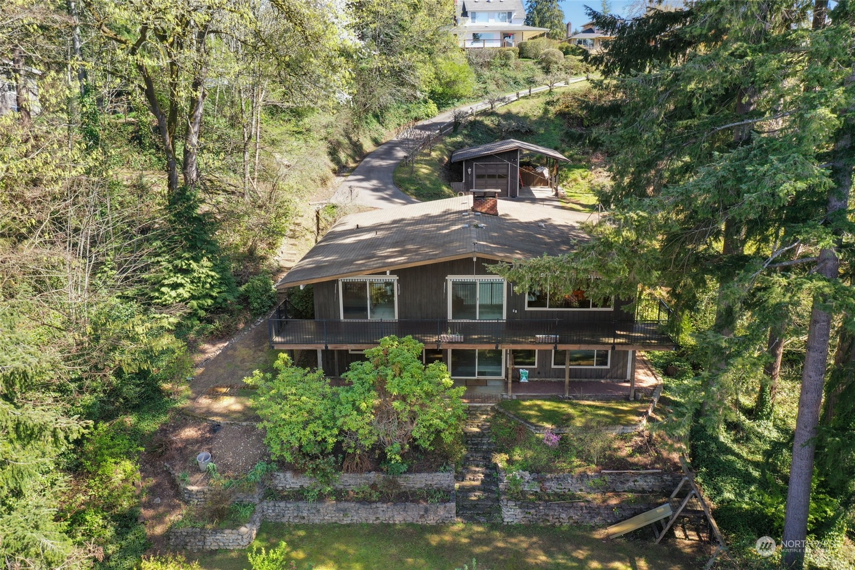 3545 Boston Harbor Road Northeast Olympia, WA 98506 - Photo 35 of 36 a backyard of a house with yard table and chairs