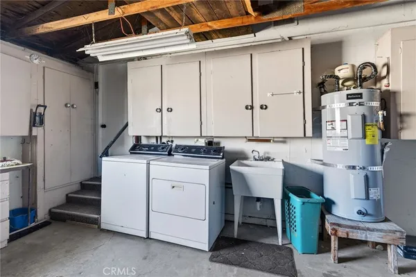 a utility room with cabinets