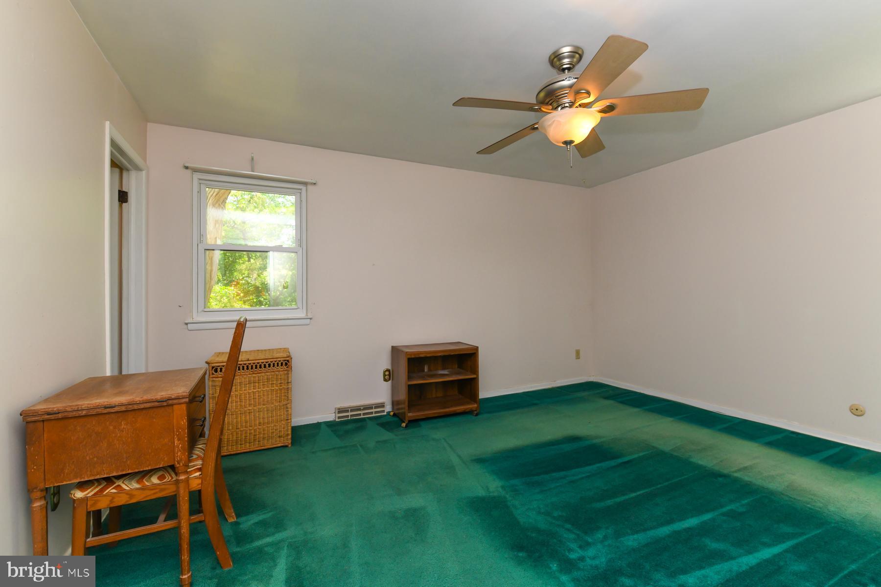 48 Sunset Drive Mount Holly, NJ 08060 - Photo 23 of 46 a view of a room with furniture and a chandelier fan