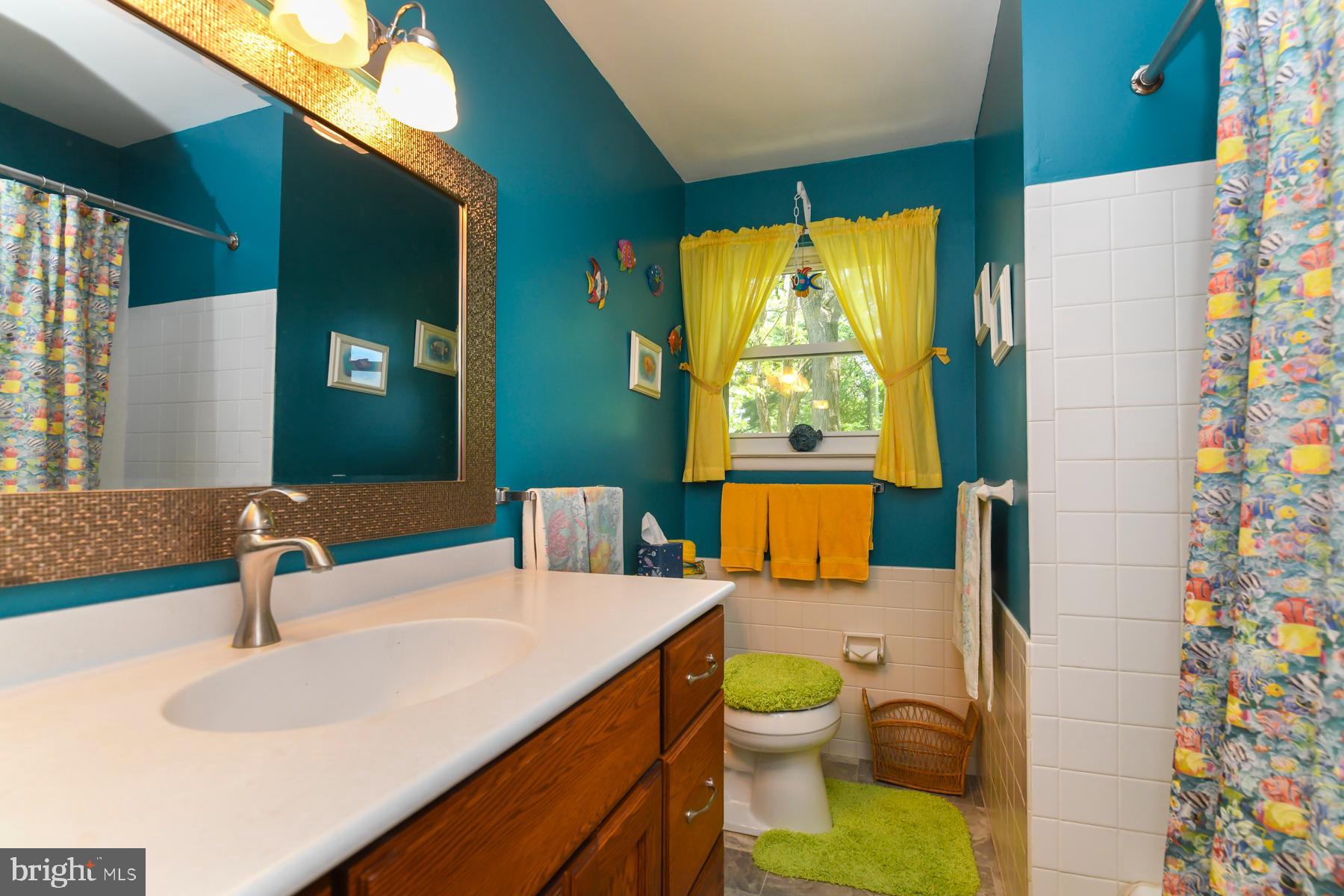 48 Sunset Drive Mount Holly, NJ 08060 - Photo 30 of 46 a bathroom with a sink toilet and mirror