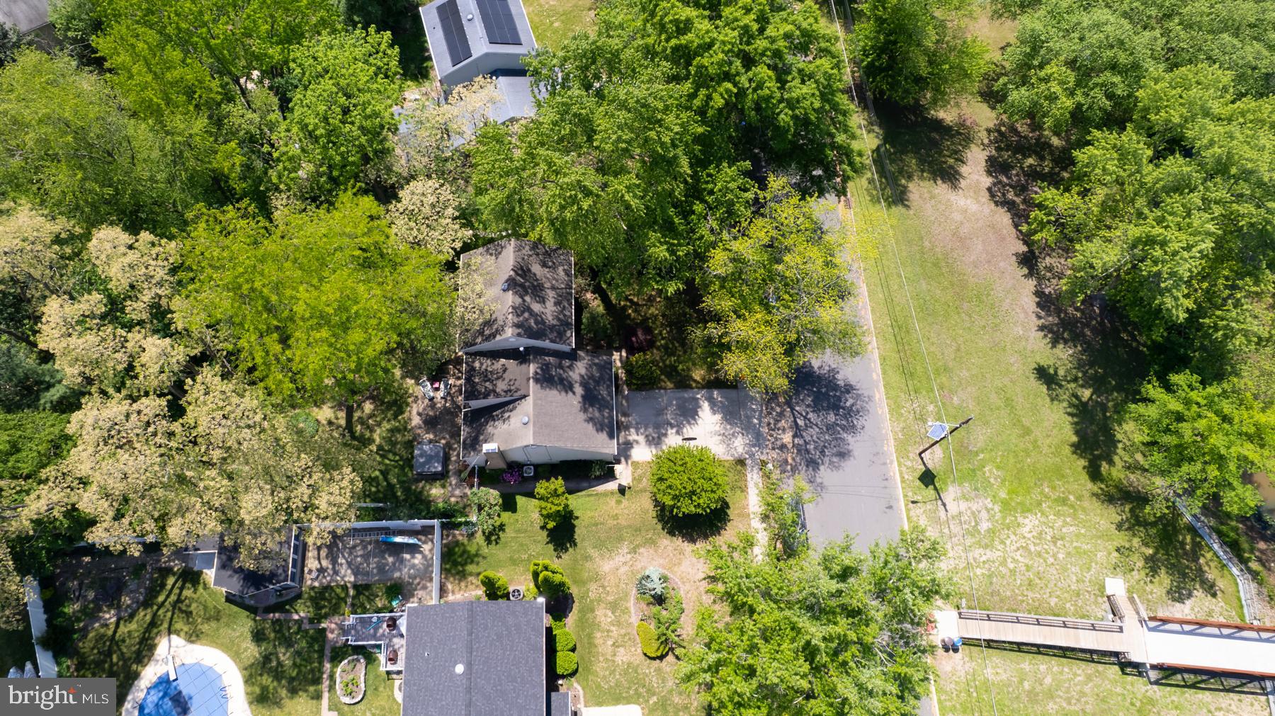 48 Sunset Drive Mount Holly, NJ 08060 - Photo 3 of 46 an aerial view of a house with a yard basket ball court and outdoor seating