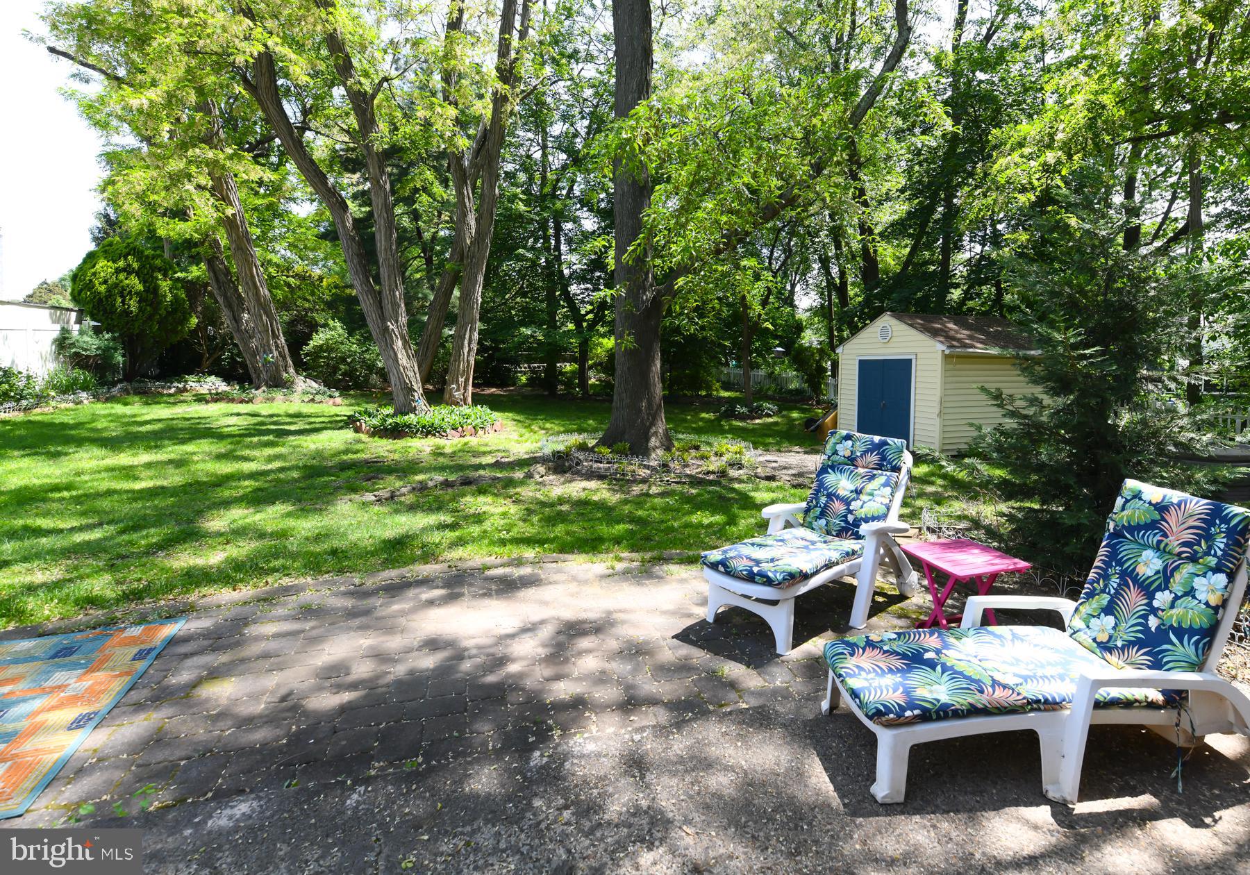 48 Sunset Drive Mount Holly, NJ 08060 - Photo 35 of 46 a view of backyard with seating area and green space