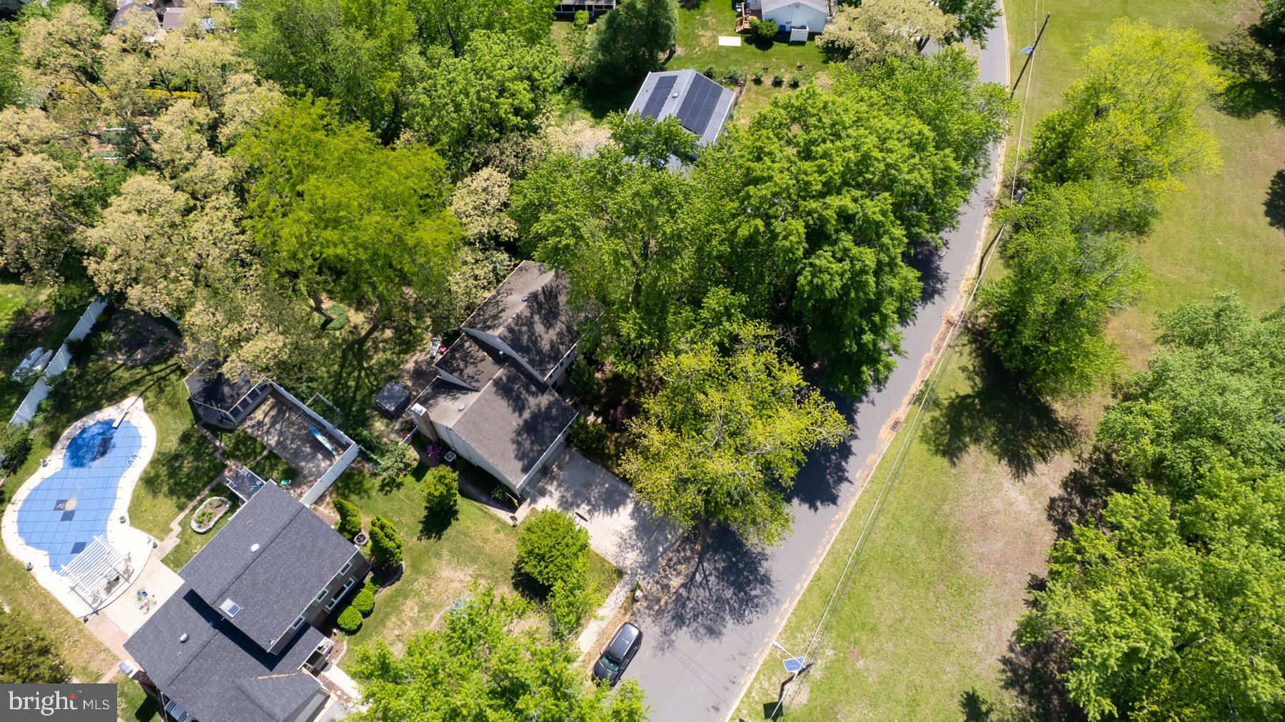 48 Sunset Drive Mount Holly, NJ 08060 - Photo 41 of 46 an aerial view of residential house with outdoor space and trees all around