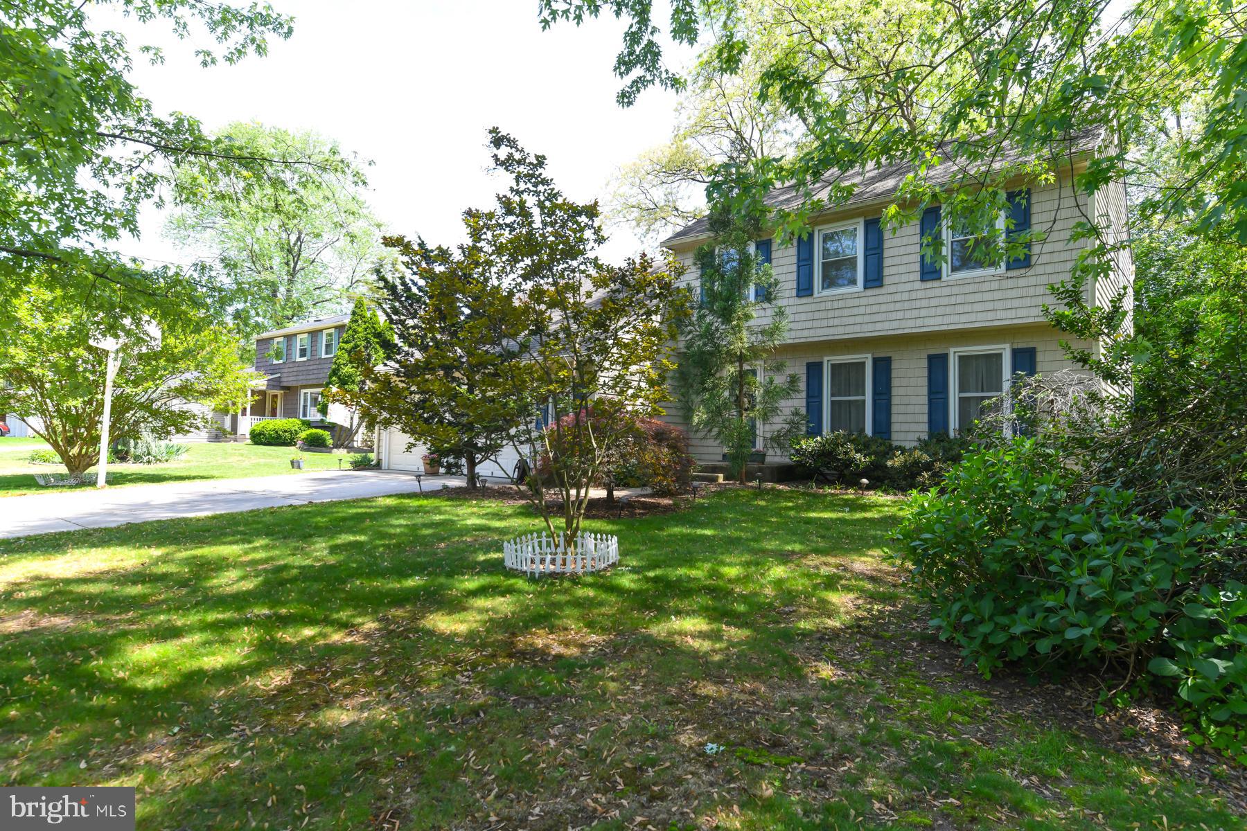 48 Sunset Drive Mount Holly, NJ 08060 - Photo 5 of 46 a front view of a house with a yard