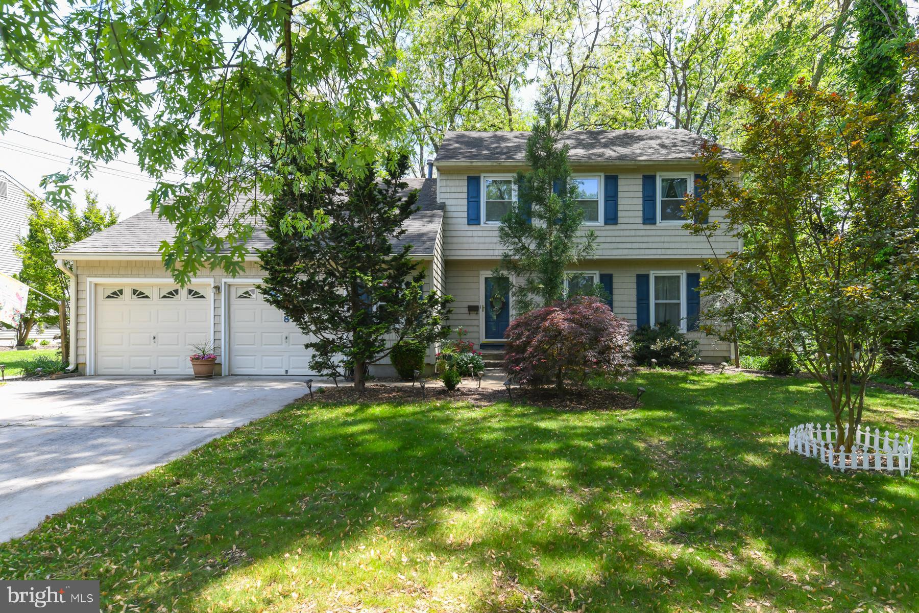 48 Sunset Drive Mount Holly, NJ 08060 - Photo 6 of 46 a front view of a house with a garden and yard