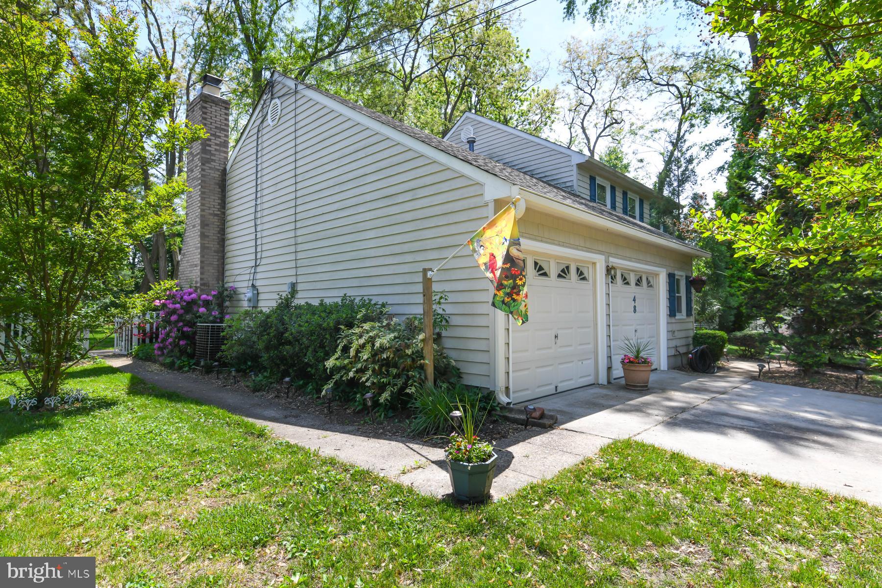 48 Sunset Drive Mount Holly, NJ 08060 - Photo 7 of 46 a view of a house with a yard and a garden