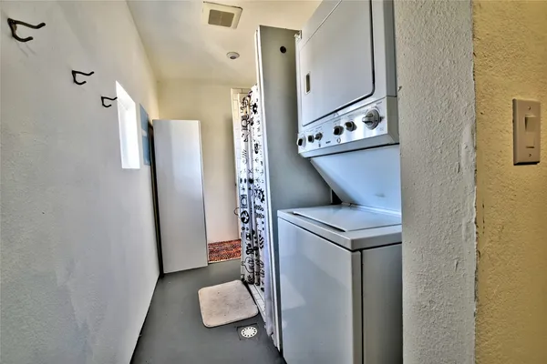 a view of a hallway with elevator