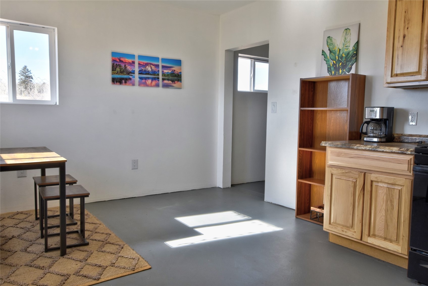 160 Rhyolite Drive Como, CO 80432 - Photo 4 of 14 a hallway with cabinets and wooden floor