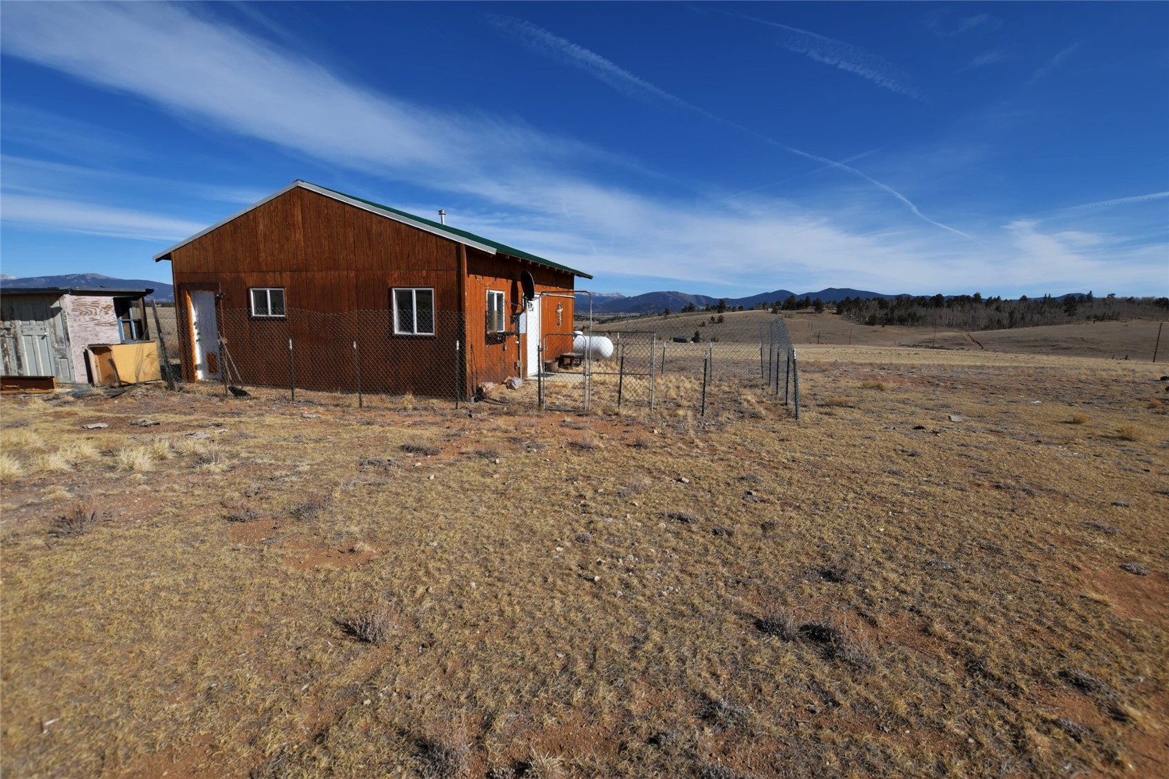 160 Rhyolite Drive Como, CO 80432 - Photo 5 of 14 a big house with a yard