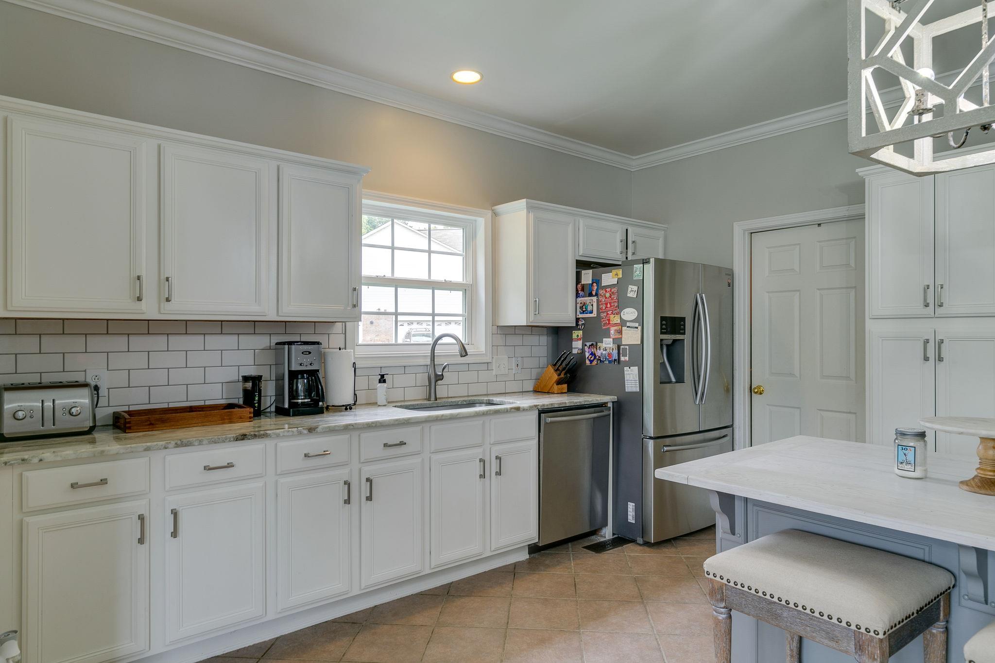 2137 Spring Lake Drive Spring Hill, TN 37174 - Photo 13 of 23 a kitchen with sink and cabinets