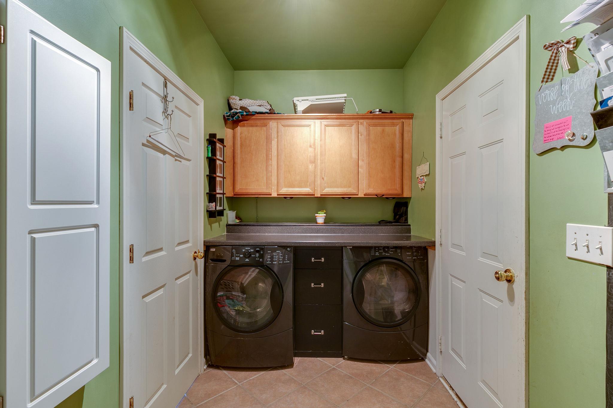 2137 Spring Lake Drive Spring Hill, TN 37174 - Photo 15 of 23 a utility room with dryer and washer