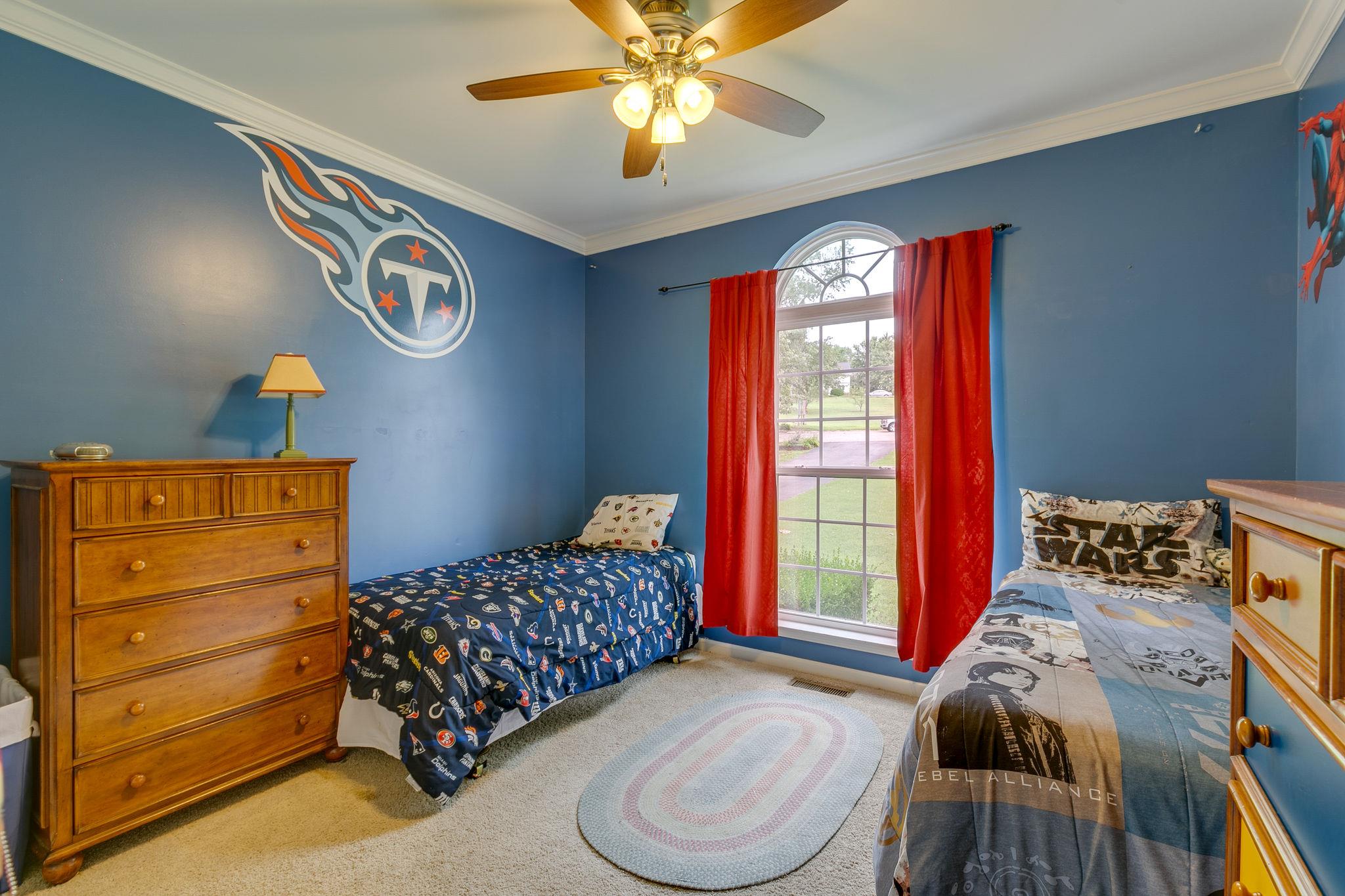 2137 Spring Lake Drive Spring Hill, TN 37174 - Photo 17 of 23 a bedroom with a bed and window