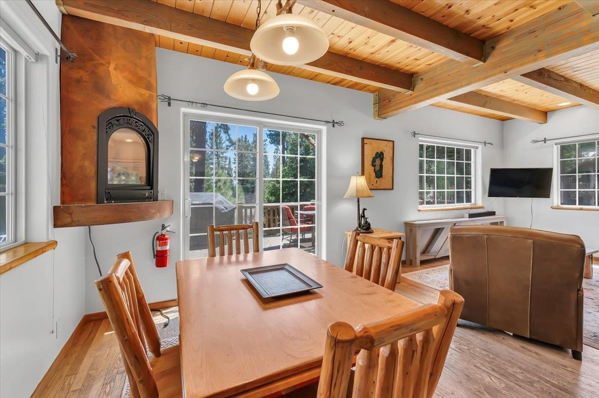 200 Estates Drive Tahoe Vista, CA 96148 - Photo 13 of 25 a dining room with furniture and window