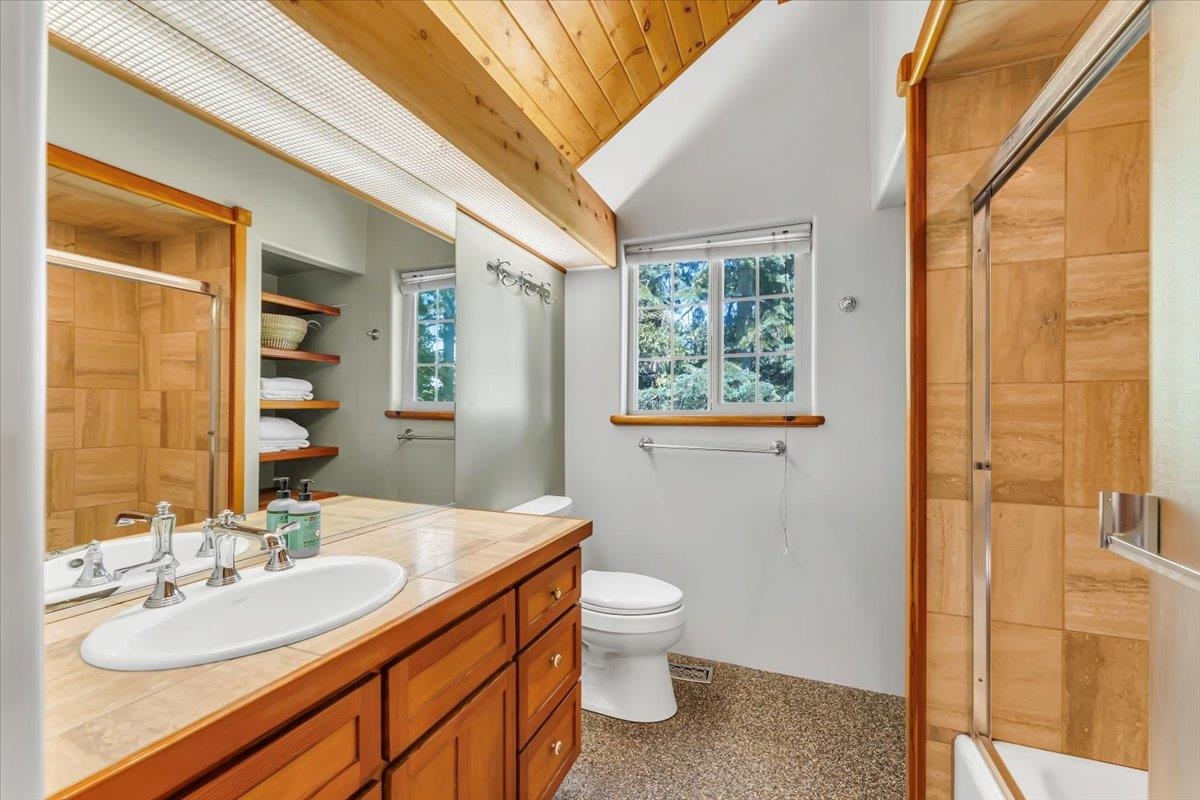 200 Estates Drive Tahoe Vista, CA 96148 - Photo 19 of 25 a bathroom with a granite countertop sink toilet and shower