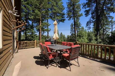 a view of a chairs and tables in the balcony