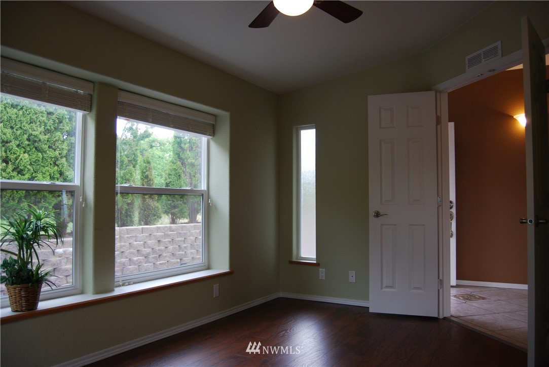 12 Caudill Road Omak, WA 98841 - Photo 16 of 37 a view of room with window and wooden floor