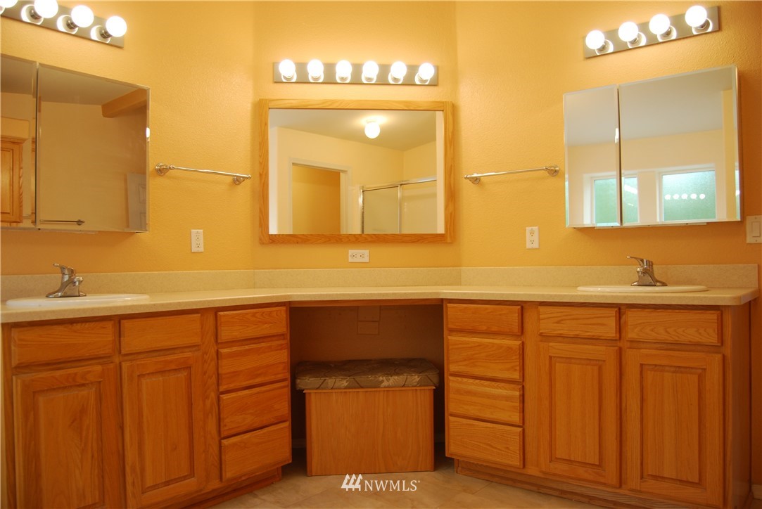 12 Caudill Road Omak, WA 98841 - Photo 34 of 37 a bathroom with a sink and a mirror