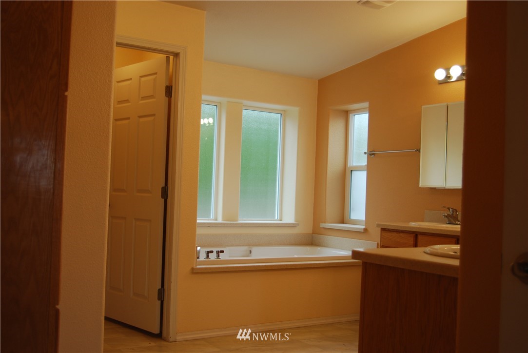 12 Caudill Road Omak, WA 98841 - Photo 35 of 37 a bathroom with a sink and a mirror