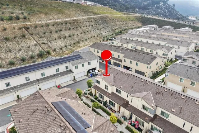 an aerial view of residential building and parking space