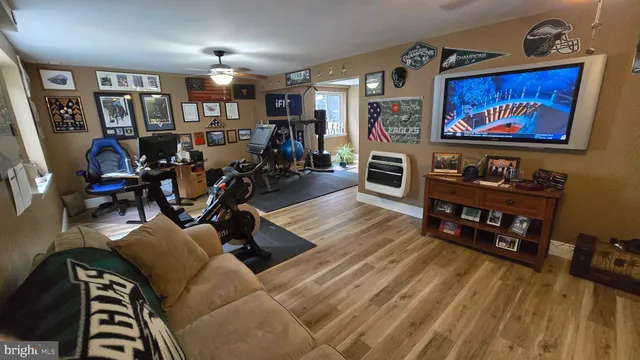 a view of a livingroom with furniture and window