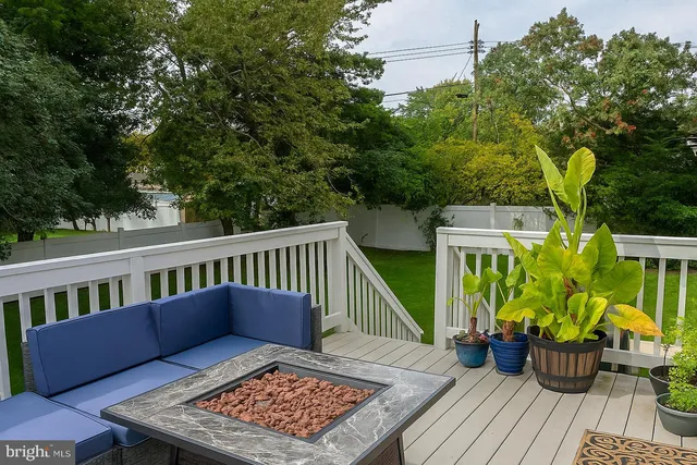 a view of balcony with furniture