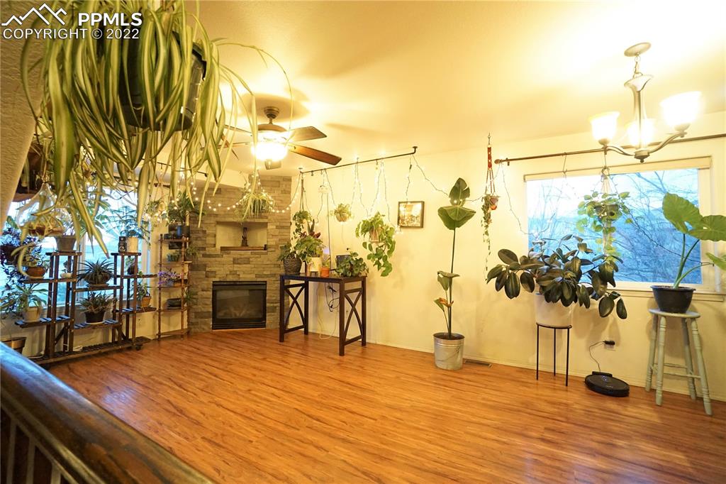 980 Mesa Valley Road, Unit 108 Colorado Springs, CO 80907 - Photo 2 of 21 a view of a patio with a table and chairs