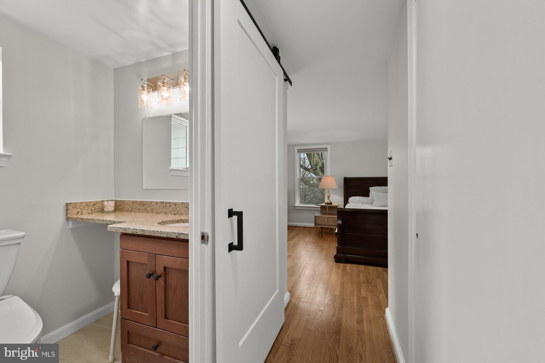 5612 Marengo Road Bethesda, MD 20816 - Photo 17 of 38 Primary bath has barn door