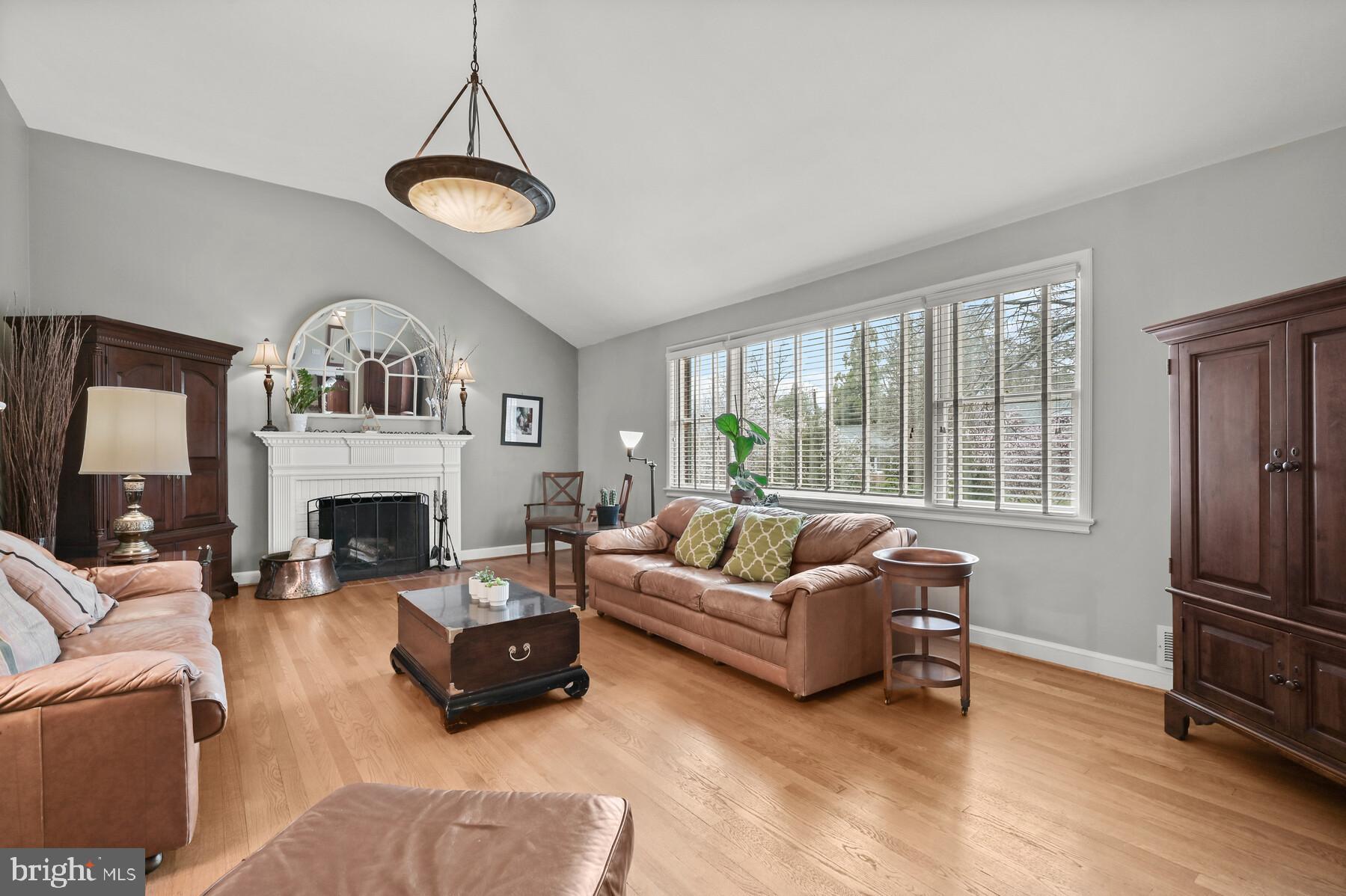 5612 Marengo Road Bethesda, MD 20816 - Photo 6 of 38 Living room with fireplace - bright!