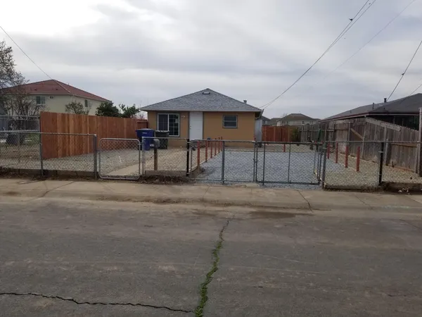 a view of house with a street