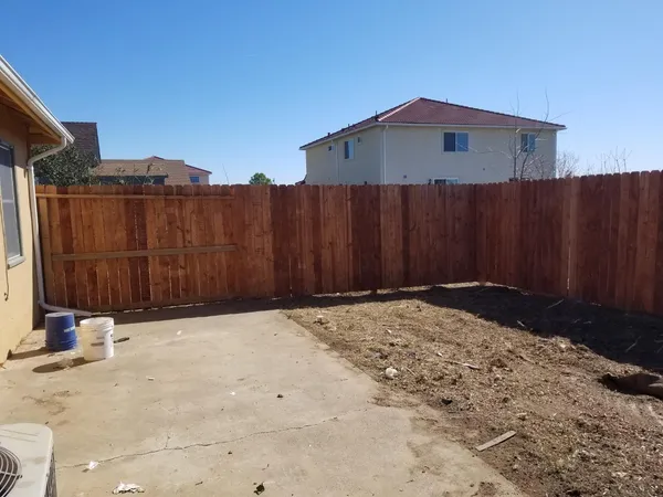 a view of a wooden fence