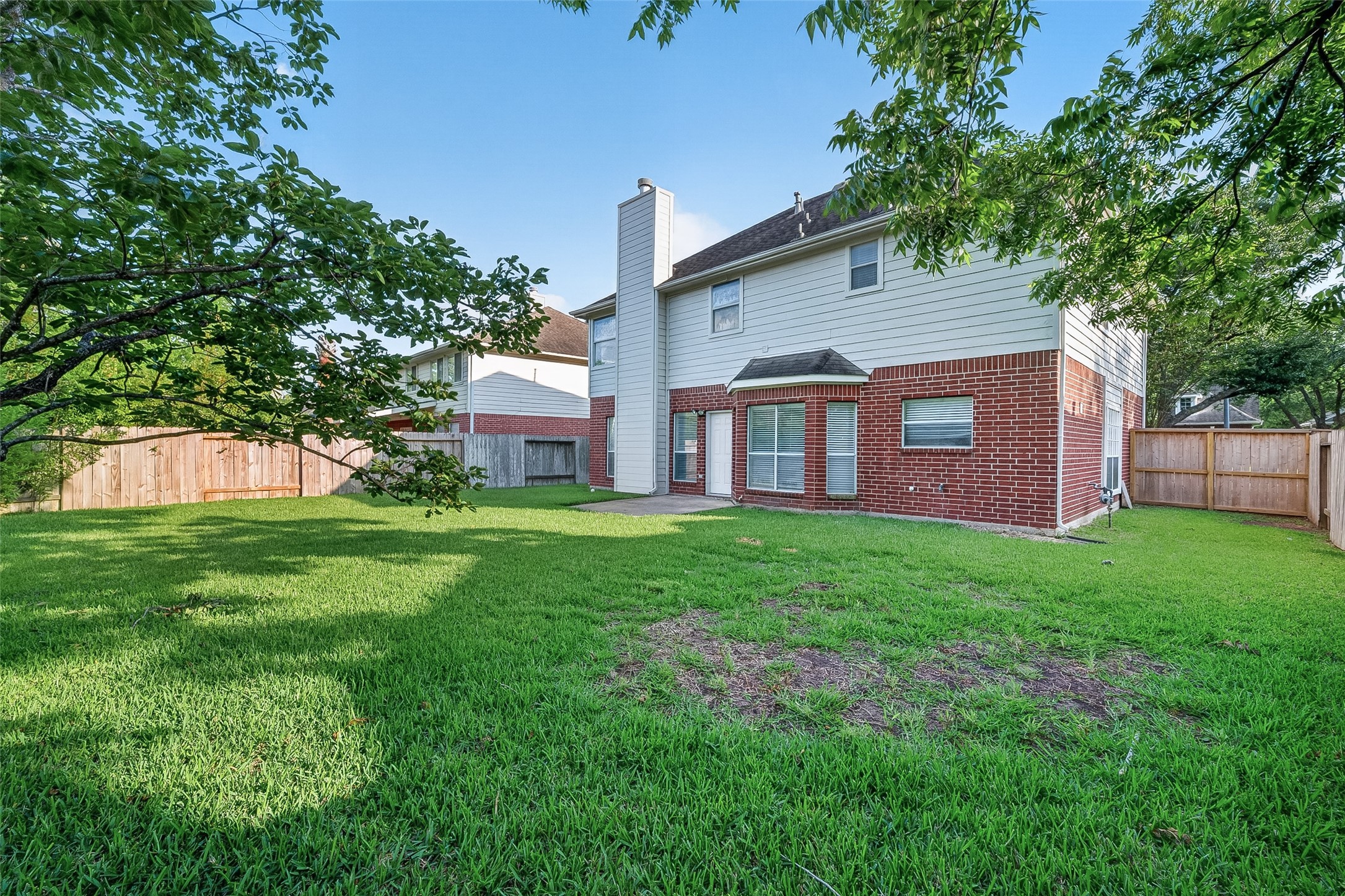 4539 Springfield Lakes Street Sugar Land, TX 77479 - Photo 34 of 34 a view of a house with yard and tree s
