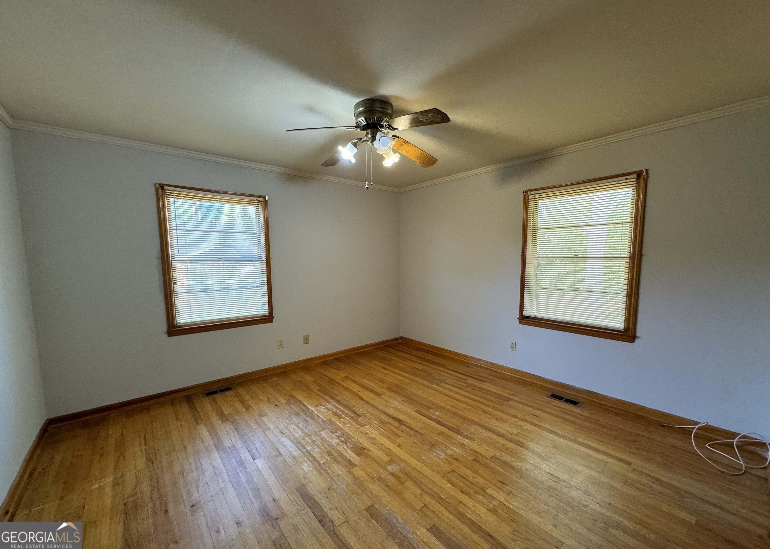 133 McCaskill Drive Jackson, GA 30233 - Photo 17 of 26 a view of an empty room and window