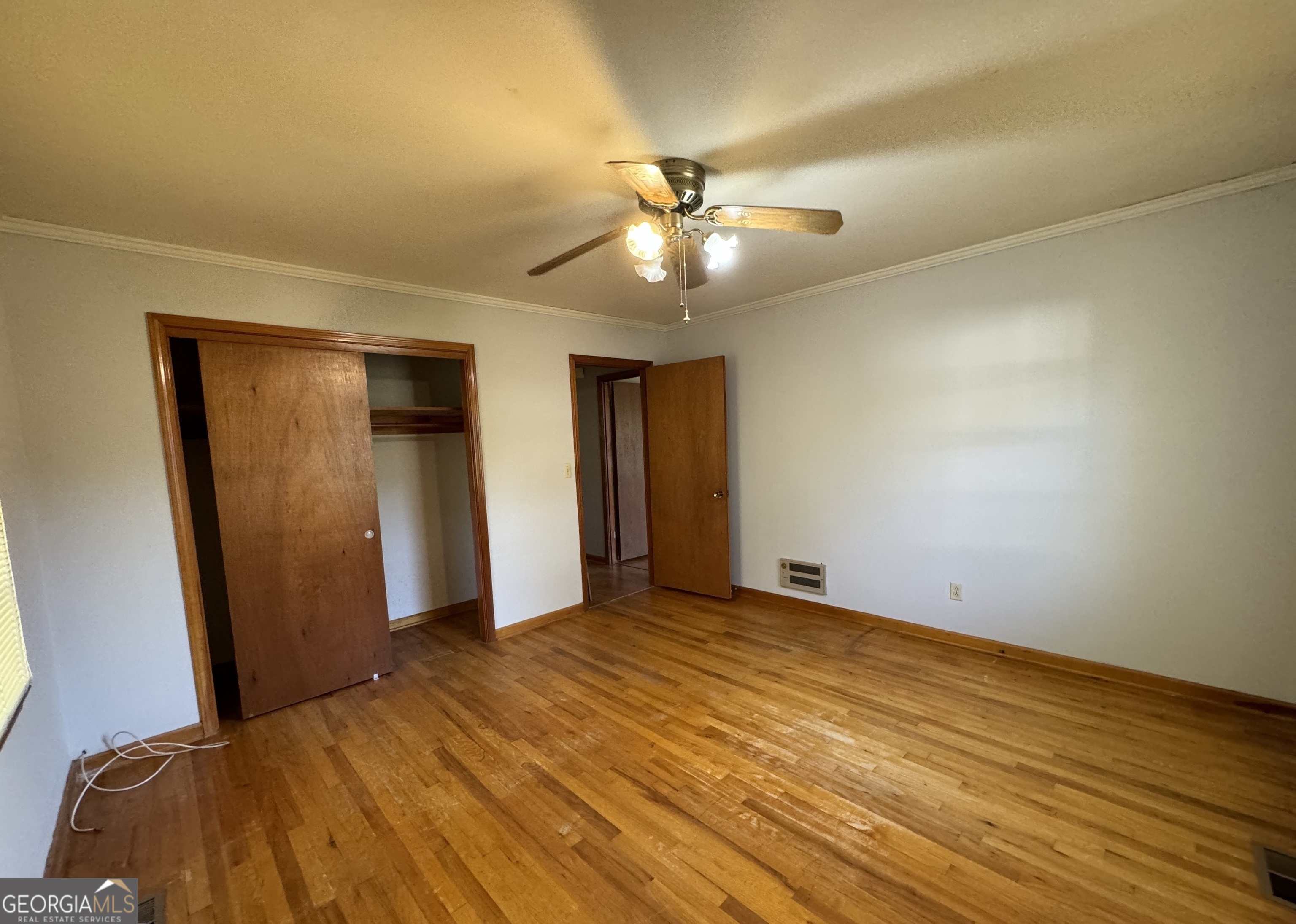 133 McCaskill Drive Jackson, GA 30233 - Photo 18 of 26 a view of empty room with wooden floor