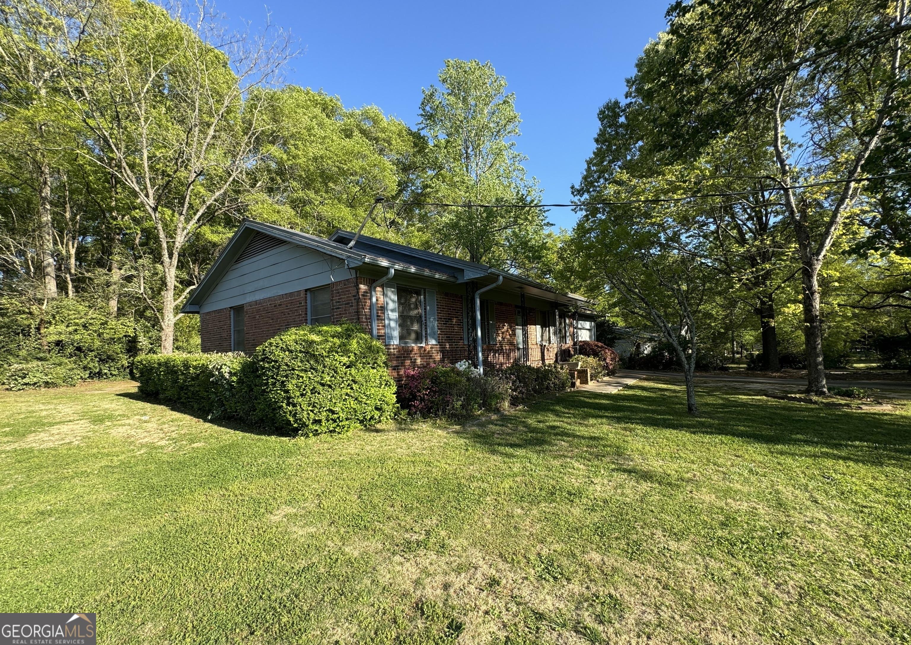 133 McCaskill Drive Jackson, GA 30233 - Photo 22 of 26 a view of a house with a yard and sitting area