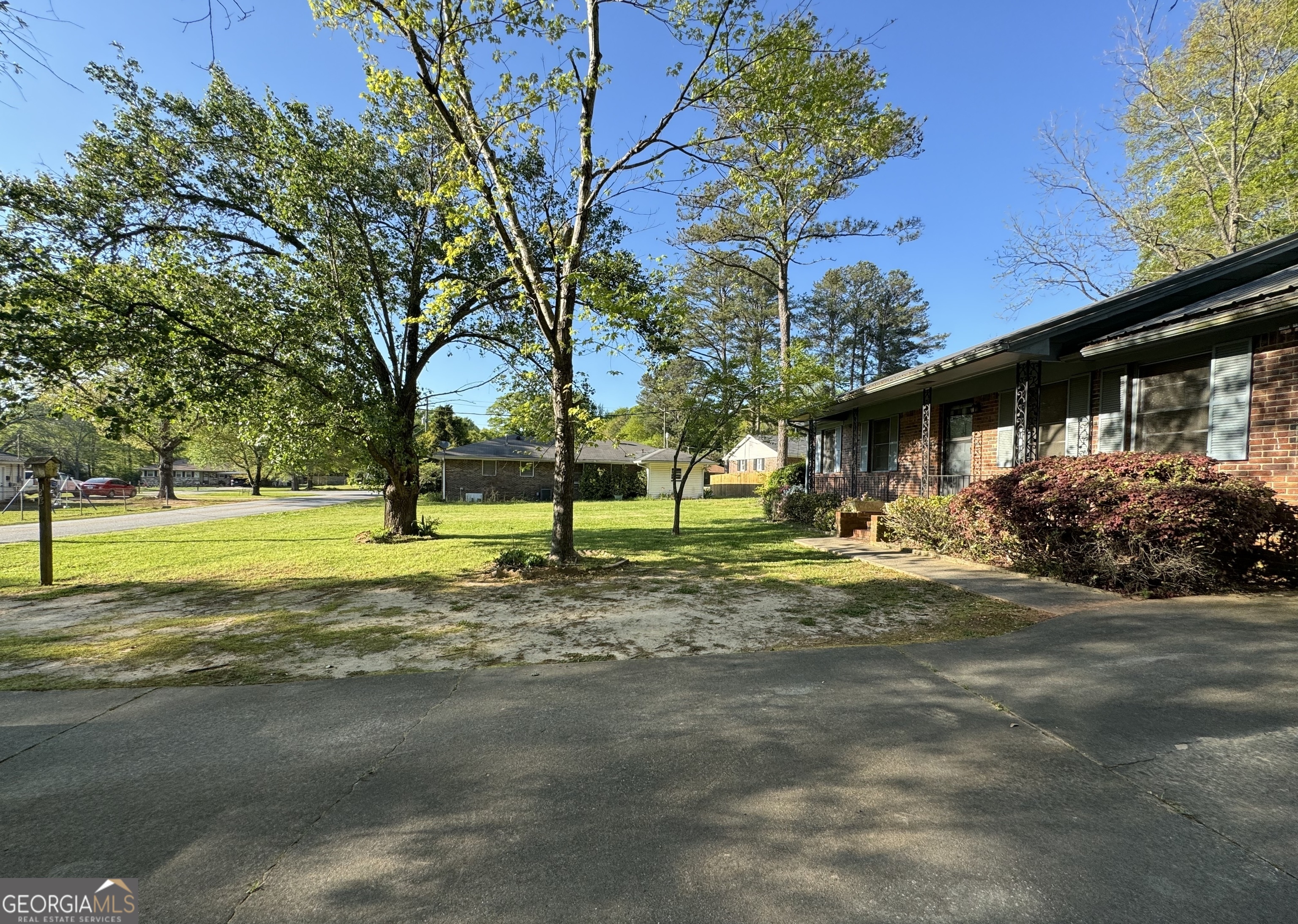 133 McCaskill Drive Jackson, GA 30233 - Photo 26 of 26 a view of a house with backyard and tree s