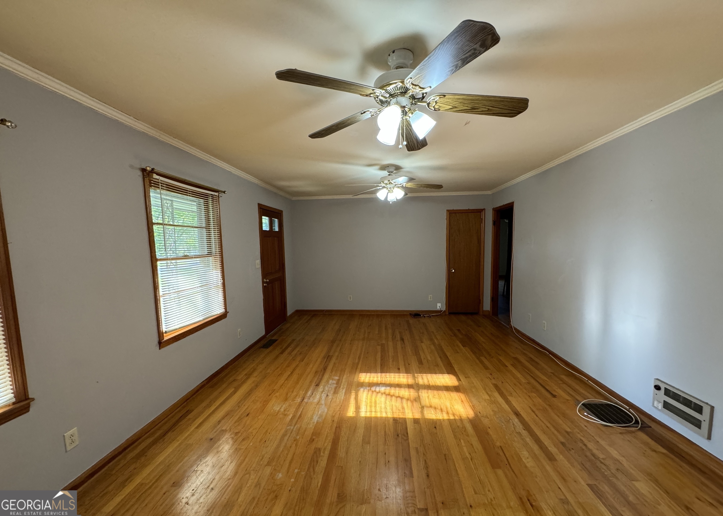 133 McCaskill Drive Jackson, GA 30233 - Photo 5 of 26 a view of an empty room and window
