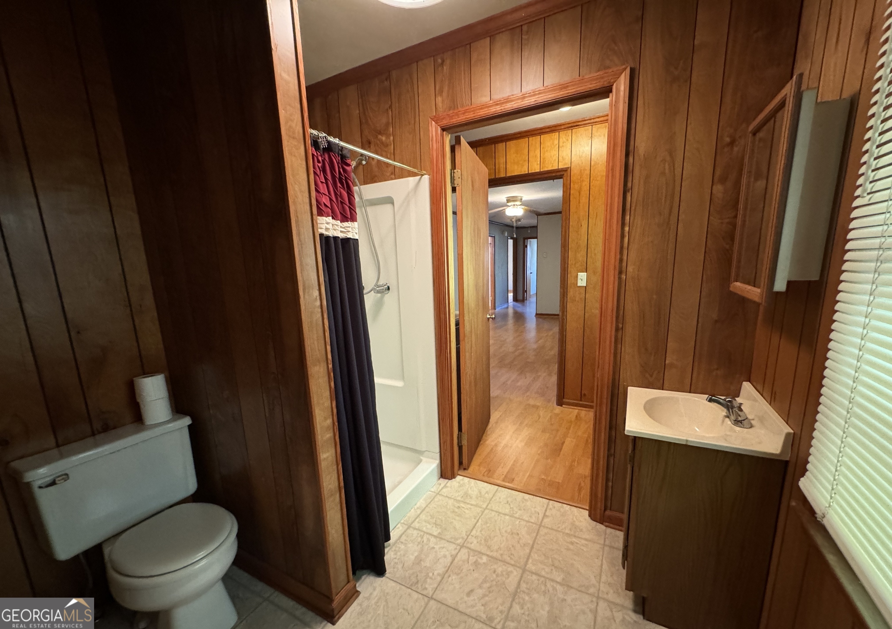 133 McCaskill Drive Jackson, GA 30233 - Photo 10 of 26 a bathroom with a sink and a mirror