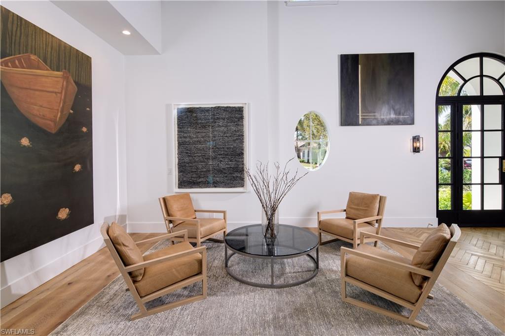 3770 Crayton Road Naples, FL 34103 - Photo 7 of 26 a living room with furniture and a window
